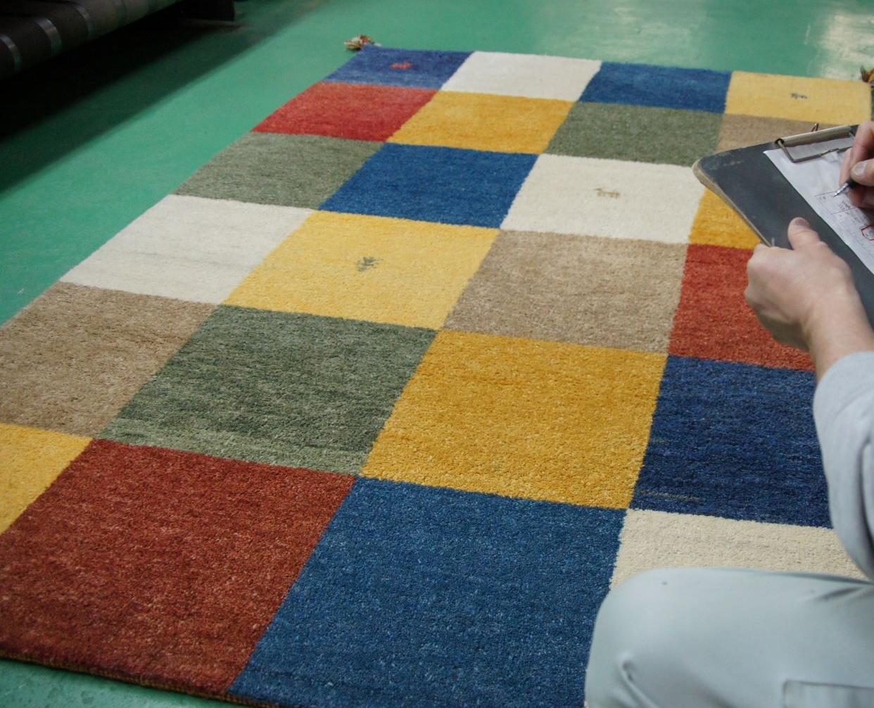 集荷・確認(傷み・ほつれチェック)